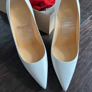 White Louboutins with scratch resists bottoms